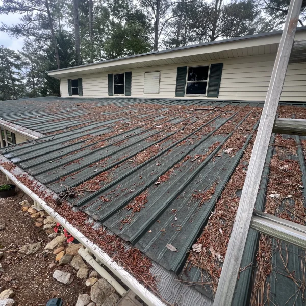 Before Pressure Washing And Debris Removal On A Roof