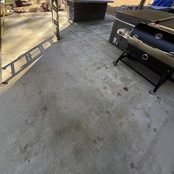 Patio Before Concrete Pressure Washing